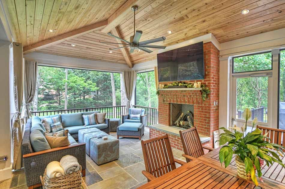 covered porch with flat screen tv by hopedale builsers in charlotte