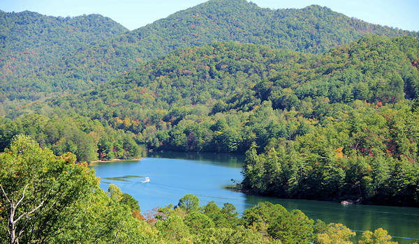 lake santeetlah covered in trees - photo by Romantic Asheville