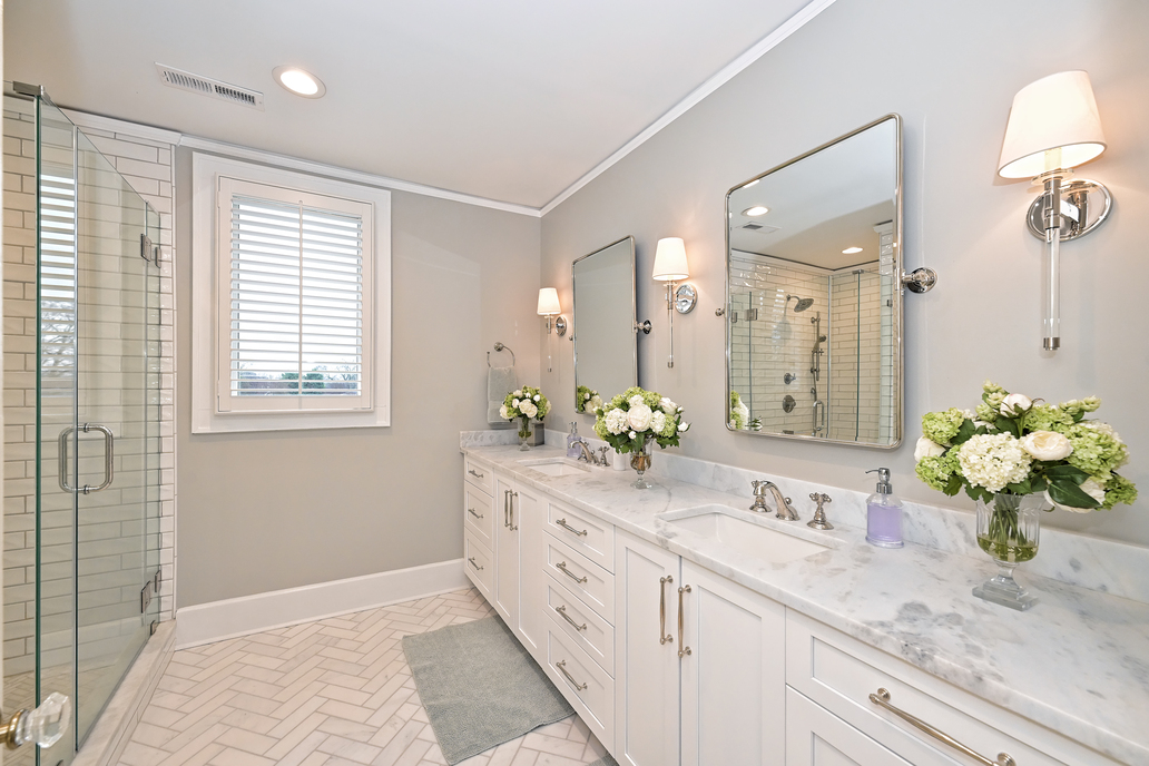remodeled bathroom with white cabinets, double vanity, and walk in shower by Hopedale Builders in Dilworth, Charlotte, NC remodeled bathroom with white cabinets, double vanity, and walk in shower by Hopedale Builders in Dilworth, Charlotte, NC
