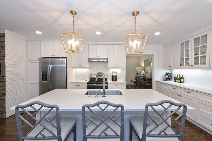 kitchen remodel with white cabinets and blue chairs in Charlotte, NC by Hopedale Builders