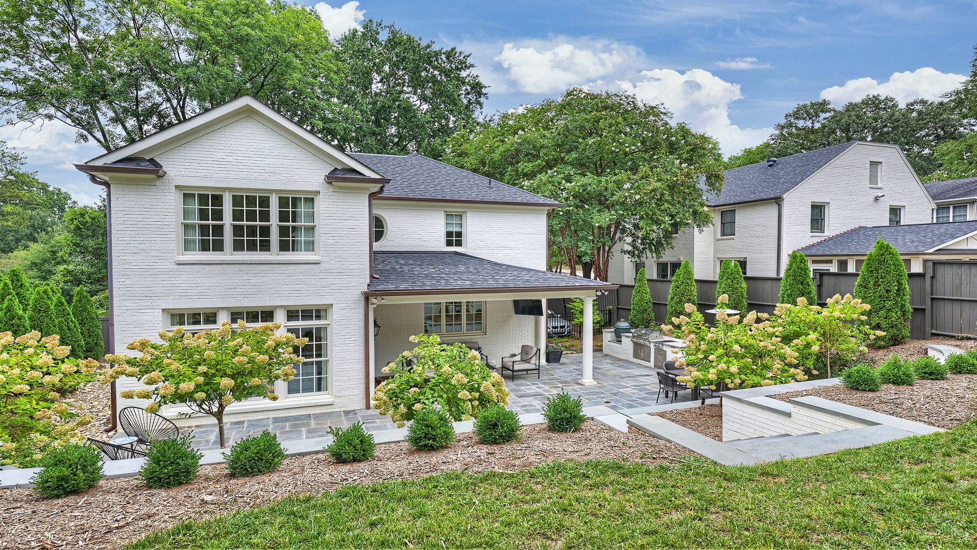 Suite Addition Exterior on White Home in Charlotte, NC by Hopedale Builders