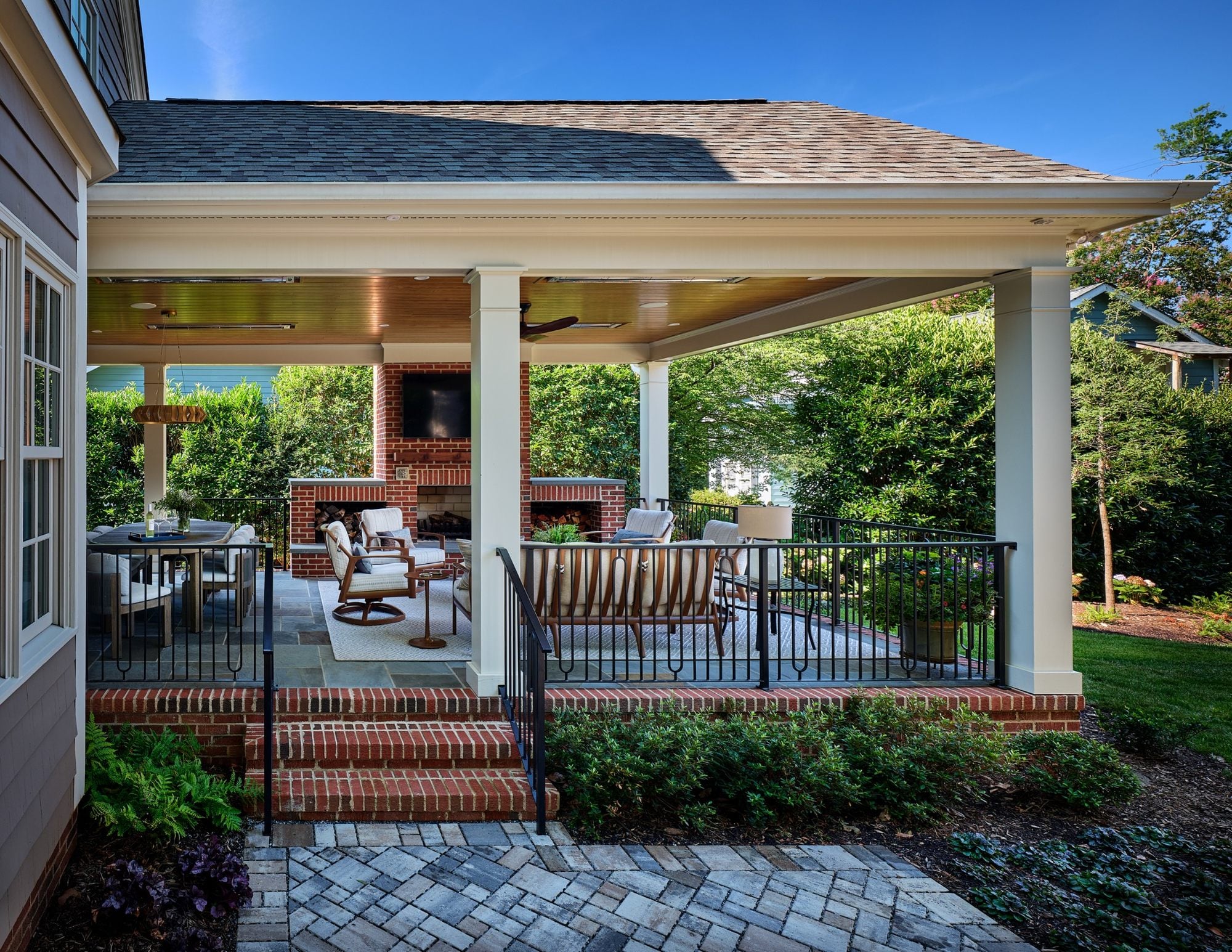 covered porch with outdoor living and dining areas in dilworth nc covered porch and detached adu