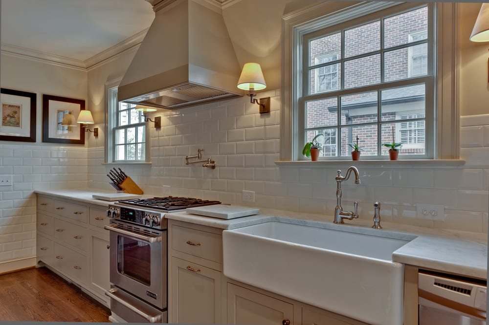 myers park kitchen addition with white farmhouse sink by hopedale builders in charlotte myers park kitchen addition with white farmhouse sink by hopedale builders in charlotte